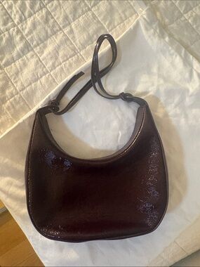 Reformation Glossy Plum Crescent Shoulder Bag